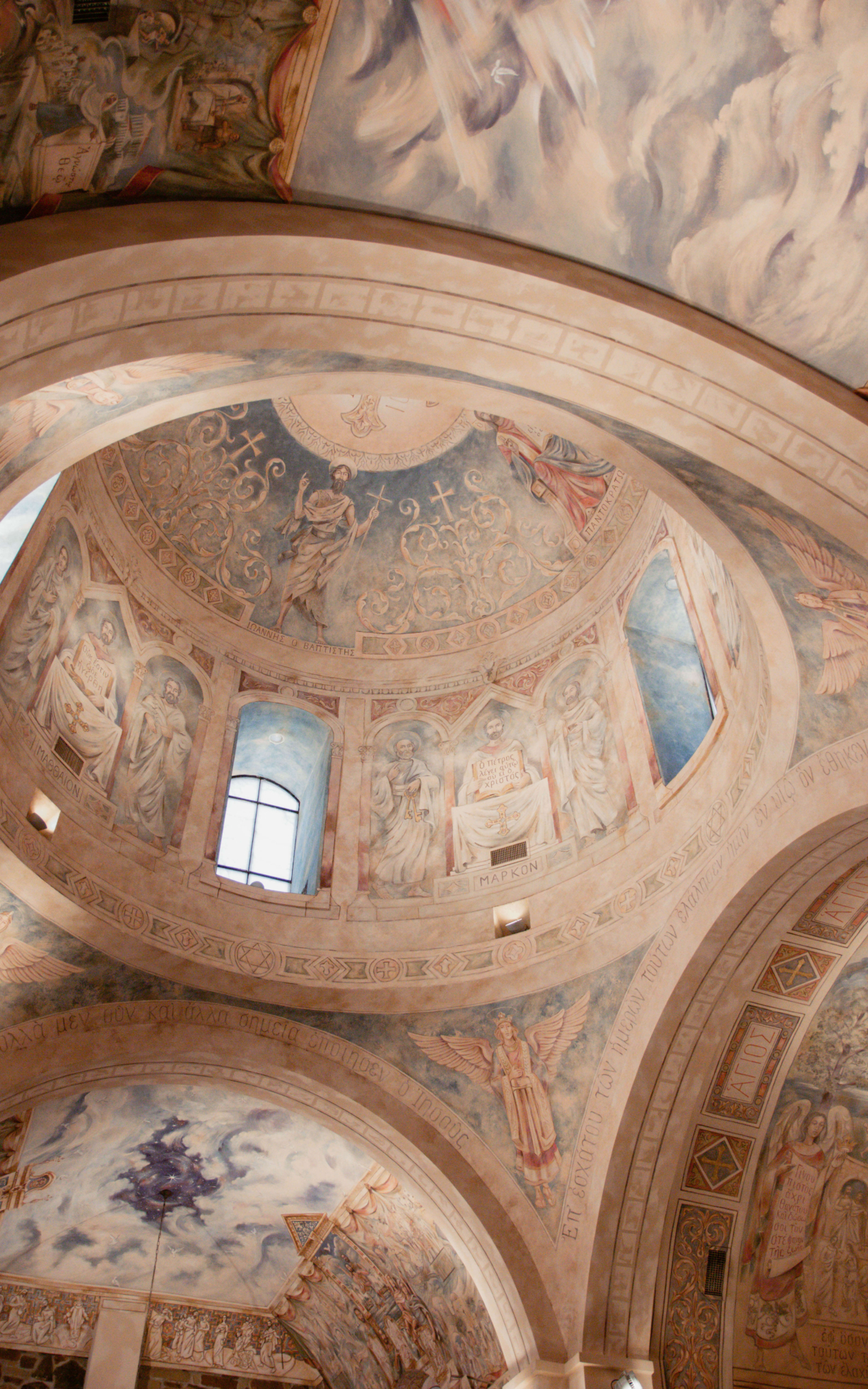 The ceiling of the chapel. A large dome is hand painted.